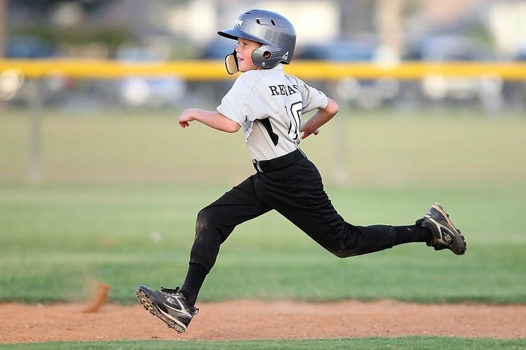 Young Baseball Player Running