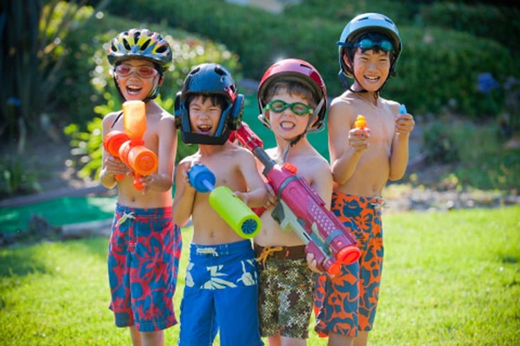 kids playing with water guns